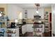 Bright kitchen with white cabinets, stainless steel appliances, and a stylish island with seating at 3606 Packhorse Run, Marietta, GA 30066
