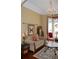 Comfortable living room with a chandelier, cozy seating, and large windows with decorative drapes at 3606 Packhorse Run, Marietta, GA 30066