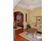 Inviting living room with hardwood floors, a decorative chandelier, and an archway to the dining area at 3606 Packhorse Run, Marietta, GA 30066