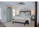Serene bedroom with a tray ceiling, a king-sized bed, and an armoire for ample storage at 3606 Packhorse Run, Marietta, GA 30066