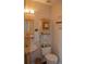 Charming powder room with unique fixtures, a pedestal sink, and decorative accessories at 3606 Packhorse Run, Marietta, GA 30066