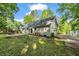 Spacious backyard with a patio area, perfect for outdoor entertaining at 4112 Willow Sw Walk, Lilburn, GA 30047