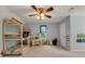 Playful bedroom with a bunk bed, desk, carpeted floors, and ample space to play at 4112 Willow Sw Walk, Lilburn, GA 30047