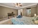 This is a spacious bedroom with direct access to a bathroom and plenty of natural light at 4112 Willow Sw Walk, Lilburn, GA 30047