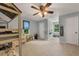 Spacious bedroom featuring light blue walls, a ceiling fan, and a bunk bed with a whimsical design at 4112 Willow Sw Walk, Lilburn, GA 30047