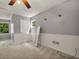 Serene bedroom showcasing light gray walls, wainscoting, a ceiling fan, and a full-length mirror at 4112 Willow Sw Walk, Lilburn, GA 30047