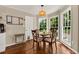 Eat-in kitchen/breakfast nook with large windows and hardwood floors at 4112 Willow Sw Walk, Lilburn, GA 30047