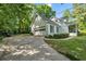 Charming home with a two-car garage and well-maintained landscaping at 4112 Willow Sw Walk, Lilburn, GA 30047