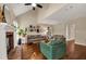 Cozy living room features hardwood floors, a fireplace, and neutral paint colors at 4112 Willow Sw Walk, Lilburn, GA 30047