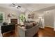 Inviting living room with fireplace, lots of natural light and hardwood floors at 4112 Willow Sw Walk, Lilburn, GA 30047