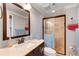 Bathroom features a stylish vanity, shower, and modern fixtures for a comfortable and functional space at 4994 Willow Creek Dr, Woodstock, GA 30188