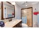 Bathroom features a stylish vanity, shower, and modern fixtures for a comfortable and functional space at 4994 Willow Creek Dr, Woodstock, GA 30188