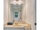 Bathroom with natural light showing vanity and faucet at 4994 Willow Creek Dr, Woodstock, GA 30188