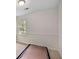 Neutral bedroom featuring a window and plush carpeting at 4994 Willow Creek Dr, Woodstock, GA 30188