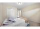 Bright bedroom with a closet for storage solutions at 4994 Willow Creek Dr, Woodstock, GA 30188