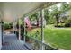 Inviting front porch view featuring classic railings and a glimpse of the serene neighborhood at 4994 Willow Creek Dr, Woodstock, GA 30188