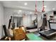 Well-equipped home gym with treadmills and weights for convenient workouts and a healthy lifestyle at 4994 Willow Creek Dr, Woodstock, GA 30188