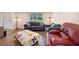 Cozy living room with comfortable seating and warm, inviting decor at 4994 Willow Creek Dr, Woodstock, GA 30188