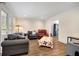 Comfortable living room with cozy seating and natural light at 4994 Willow Creek Dr, Woodstock, GA 30188