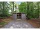 Backyard shed with gravel base provides extra storage at 4994 Willow Creek Dr, Woodstock, GA 30188