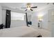 Modern bedroom featuring a connected seating area and lots of light through large windows at 1346 Peter Haughton Nw Way, Atlanta, GA 30318