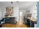 Hallway area with artistic tapestry, workspace, decor, and open access to other rooms at 1346 Peter Haughton Nw Way, Atlanta, GA 30318