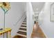 Hallway with white walls and a brown floor lead into an office space at 1346 Peter Haughton Nw Way, Atlanta, GA 30318
