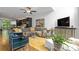 Open-concept living room with a seamless flow to the kitchen and modern furnishings at 1346 Peter Haughton Nw Way, Atlanta, GA 30318