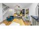 Cozy living room with a gray sectional, yellow rug, and modern decor at 1346 Peter Haughton Nw Way, Atlanta, GA 30318