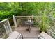 Outdoor patio with chairs, a small table, and decorative elements, perfect for relaxing or entertaining at 1346 Peter Haughton Nw Way, Atlanta, GA 30318