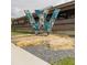 Artwork in front of restaurant with unique decor. Westside is the best side. Hustle at 1346 Peter Haughton Nw Way, Atlanta, GA 30318
