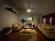 Inviting living room featuring hardwood floors, vaulted ceiling, and a cozy fireplace at 3393 Chancellors Dr, Powder Springs, GA 30127