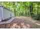 The home features a wooded, private backyard and patio at 3735 Boulder Park Sw Dr, Atlanta, GA 30331
