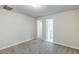 Spacious bedroom featuring neutral-toned walls, plush carpeting, and ample natural light at 3735 Boulder Park Sw Dr, Atlanta, GA 30331