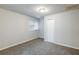 Bright bedroom featuring carpet, a window, and closet at 3735 Boulder Park Sw Dr, Atlanta, GA 30331