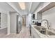 Stylish kitchen with updated appliances, granite countertops, and a view of the dining area at 874 Welch St, Atlanta, GA 30310