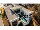 Bird's-eye view of a modern home with a long pool, well-maintained lawn, and a sophisticated roof design at 1572 Clifton Rdg, Atlanta, GA 30307