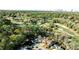 Stunning aerial view showcases the home's proximity to a lush golf course and distant city skyline at 1572 Clifton Rdg, Atlanta, GA 30307