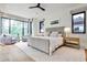 Bright bedroom with a large window, sitting area, neutral color palette, and ample natural light at 1572 Clifton Rdg, Atlanta, GA 30307