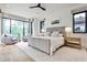 Bright bedroom with a large window, sitting area, neutral color palette, and ample natural light at 1572 Clifton Rdg, Atlanta, GA 30307