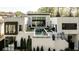 Elevated perspective showcasing a pool in the home's backyard, with a manicured lawn and plenty of patio space at 1572 Clifton Rdg, Atlanta, GA 30307