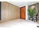 Light-filled foyer with wood accents, stone wall, large format tile flooring and custom millwork at 1572 Clifton Rdg, Atlanta, GA 30307