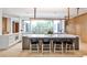 Modern kitchen featuring a center island with seating, stainless steel appliances, and large windows at 1572 Clifton Rdg, Atlanta, GA 30307