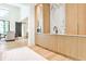 Elegant kitchen with custom wood cabinets, marble backsplash, and sleek, modern appliances at 1572 Clifton Rdg, Atlanta, GA 30307