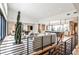 Open concept living room with hardwood floors, neutral decor, and large windows offering plenty of light at 1572 Clifton Rdg, Atlanta, GA 30307