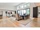 Bright, open-concept living room with high ceilings, hardwood floors, and large windows at 1572 Clifton Rdg, Atlanta, GA 30307