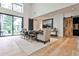 Inviting living area featuring large windows, hardwood floors, and an open layout for easy entertaining at 1572 Clifton Rdg, Atlanta, GA 30307