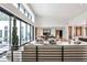 Bright living room with high ceilings, large windows, hardwood flooring and neutral tones and decor at 1572 Clifton Rdg, Atlanta, GA 30307
