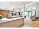 Bright open-concept living space featuring dining area, kitchen, and living room with modern finishes at 1572 Clifton Rdg, Atlanta, GA 30307