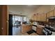 Functional kitchen with linoleum floors, ample counter space, and natural light at 2860 Camelot Woods Dr, Lawrenceville, GA 30044